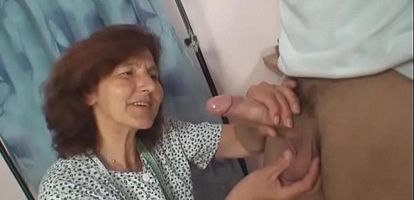  Guy fucks sewing granny from behind